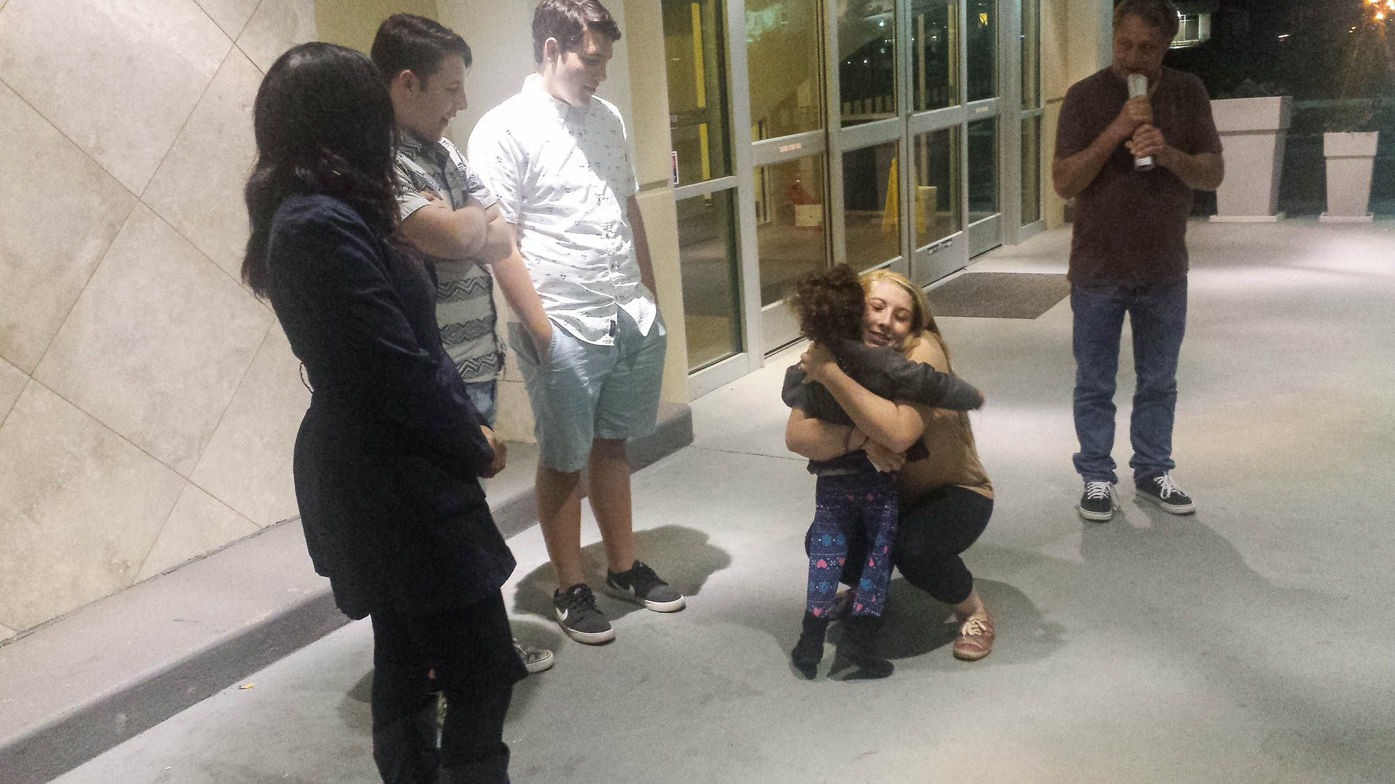 Kayla Greenwood, hugging Kenneth Williams’s granddaughter the night before the execution